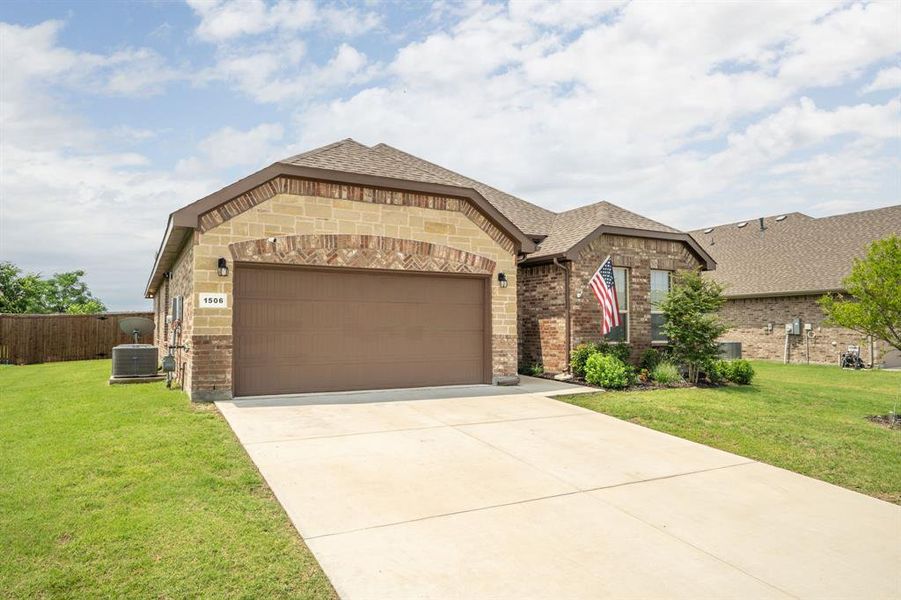 Large two-car garage provides additional storage space!