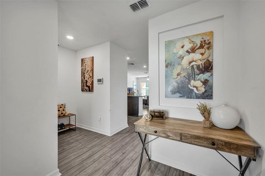 Beautiful Foyer with space for a mud room/drop area by front door and garage