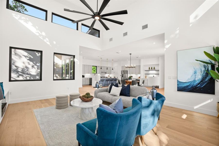 The bright and open floor plan makes it easy to stay connected with friends and family throughout the main living area.