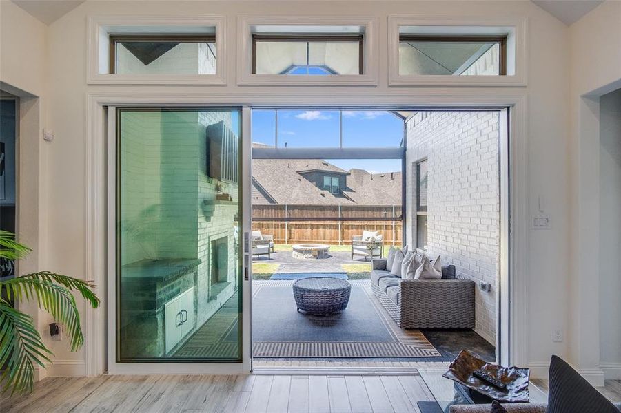 Entryway with plenty of natural light and hardwood / wood-style floors