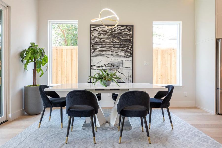 Dining area featuring light hardwood / wood-style floors