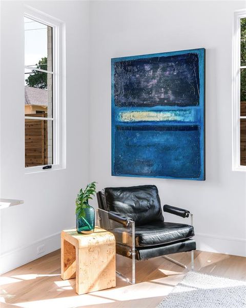 Living area with hardwood / wood-style flooring