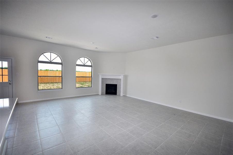 Family Room is open to the Dining, Kitchen and Breakfast room providing  Long views and open spaces.