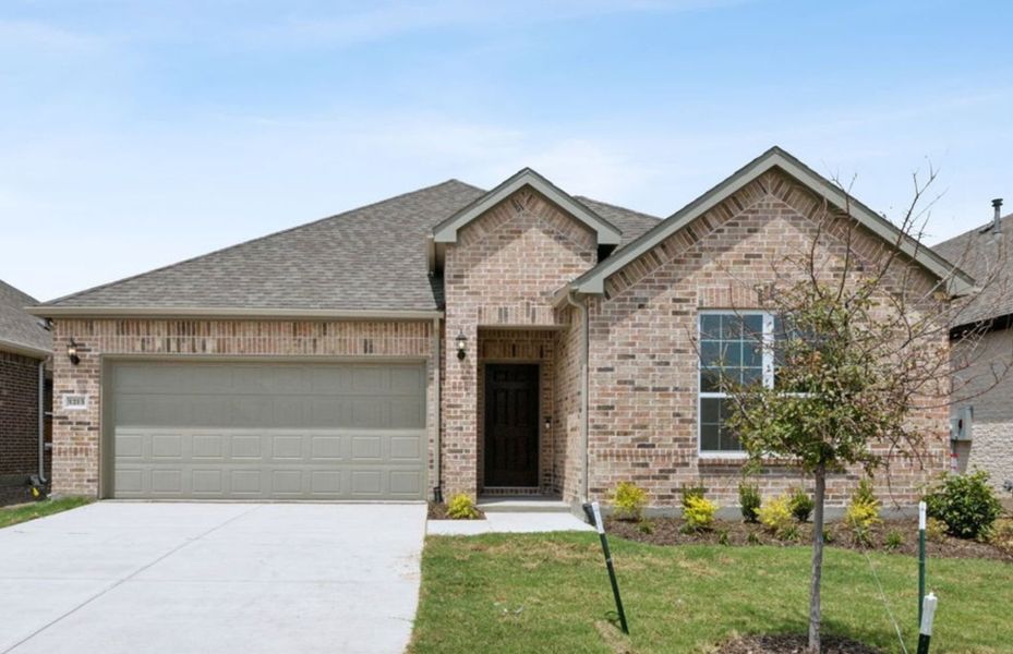 The Orchard, a one-story home with 2-car garage, shown with Home Exterior 33