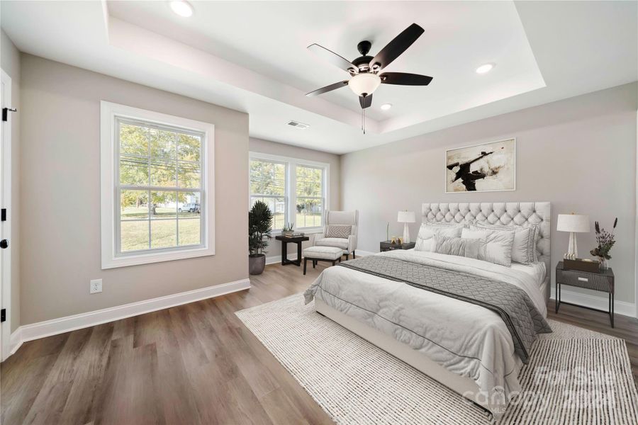 Main Bedroom with tray ceiling & two Closets.