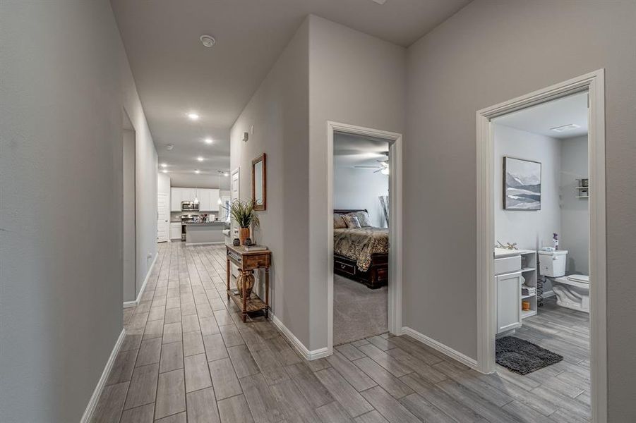 Hallway featuring light hardwood / wood-style flooring