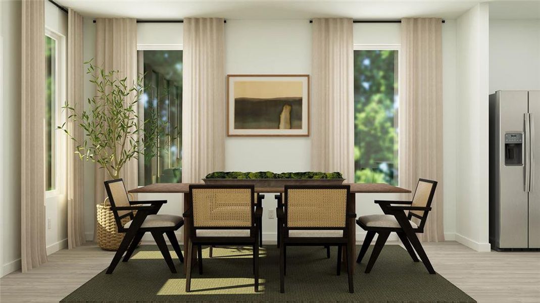 Dining space featuring light hardwood / wood-style flooring