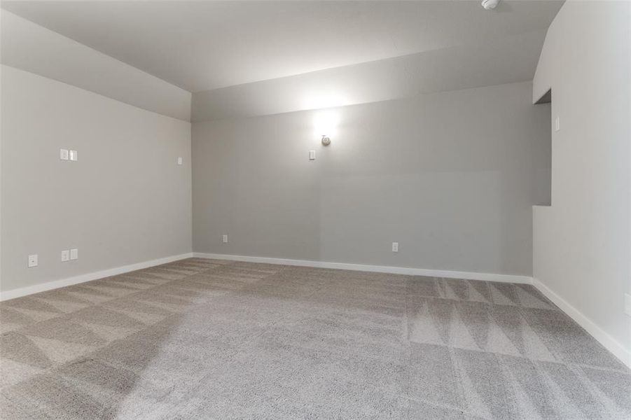 Empty room with carpet floors