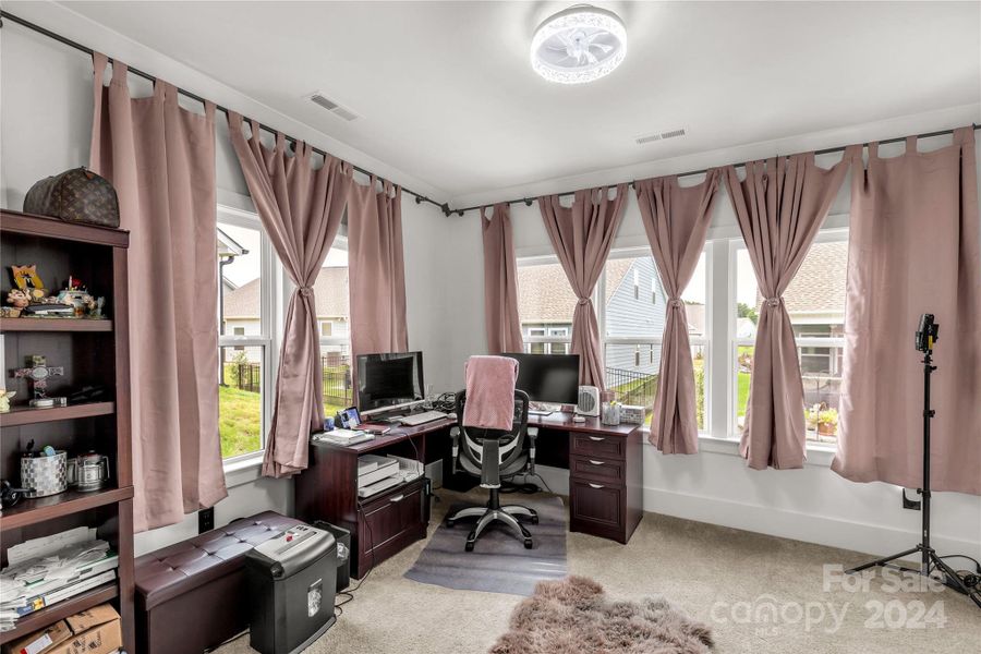 Sitting room with access to the screened in patio