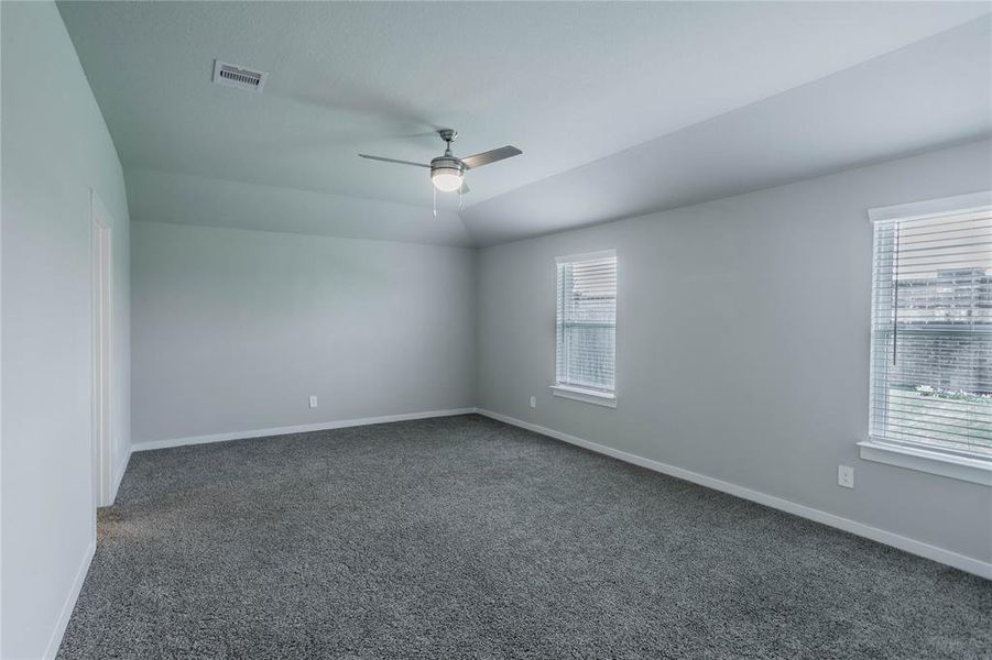 HUGE primary bedroom w/ enough space for a sitting area