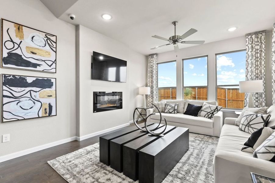 Living Room in the Wimbledon home plan by Trophy Signature Homes – REPRESENTATIVE PHOTO