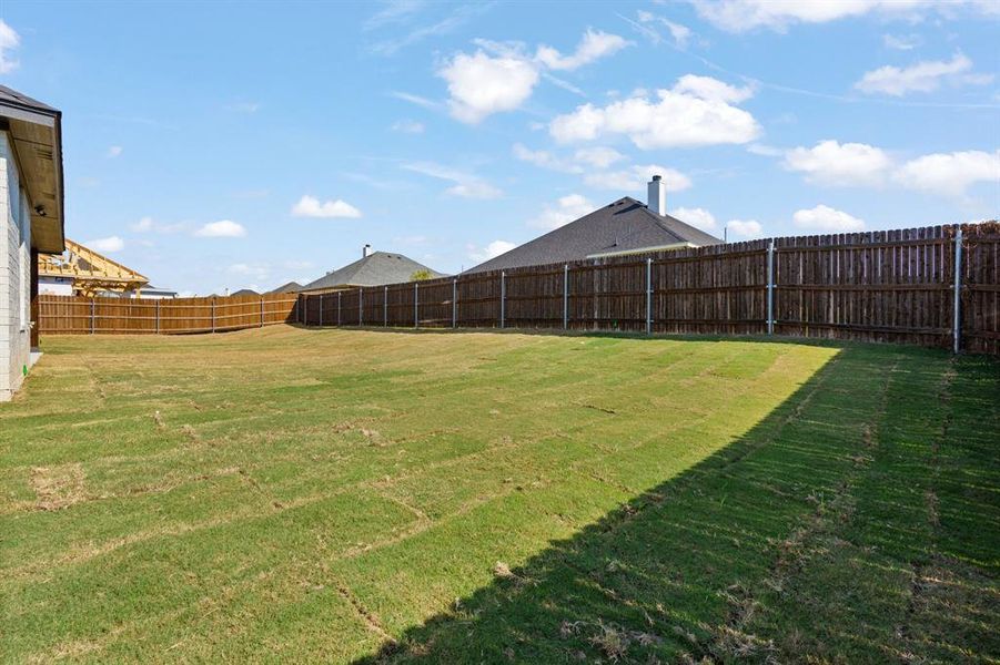 Great wooden privacy fence with metal posts