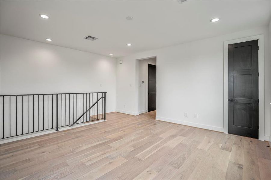 Welcome upstairs to this spacious game room/media room/workout space/flex space with a closet.