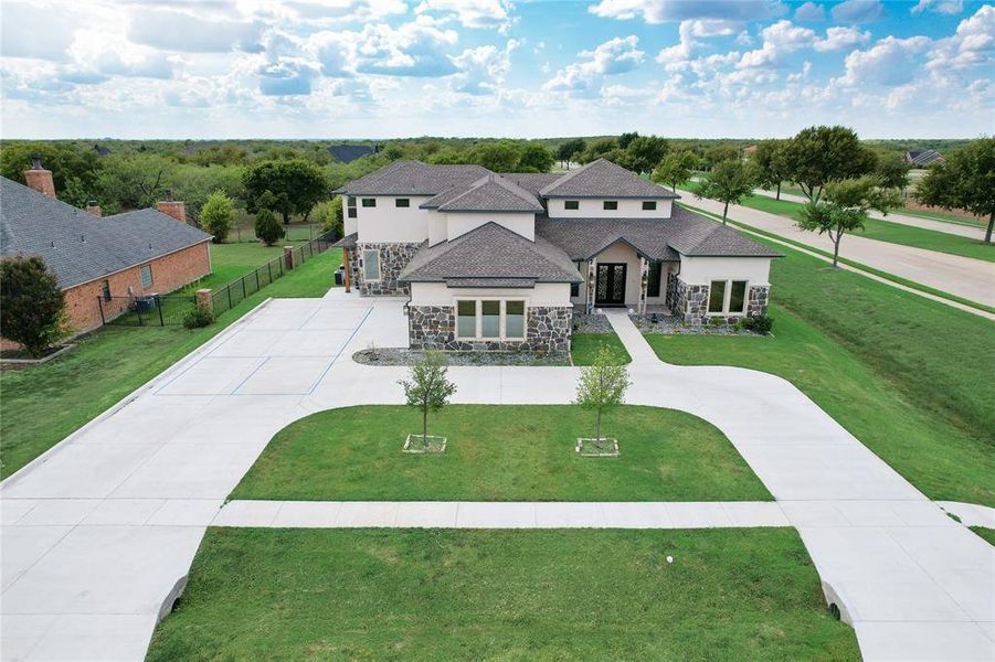 View of front of home featuring a front lawn