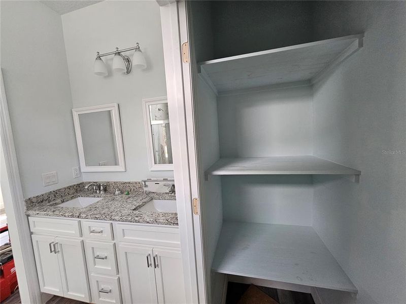 Primary Suite Bathroom with Water Closet PLUS Shelving