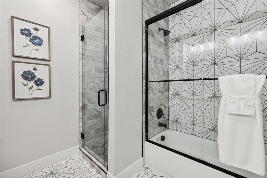 Bathroom with enclosed tub / shower combo and tile patterned floors