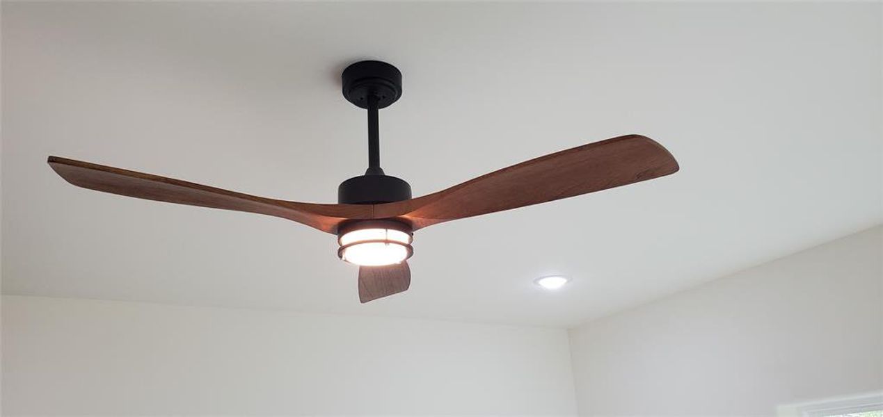 4209 Tampico St.Modern wooden propeller fan in Living area.