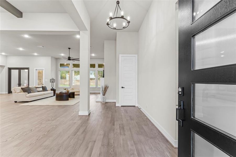 Engineered Hardwood Flooring and 12' Ceiling to Welcome You Home