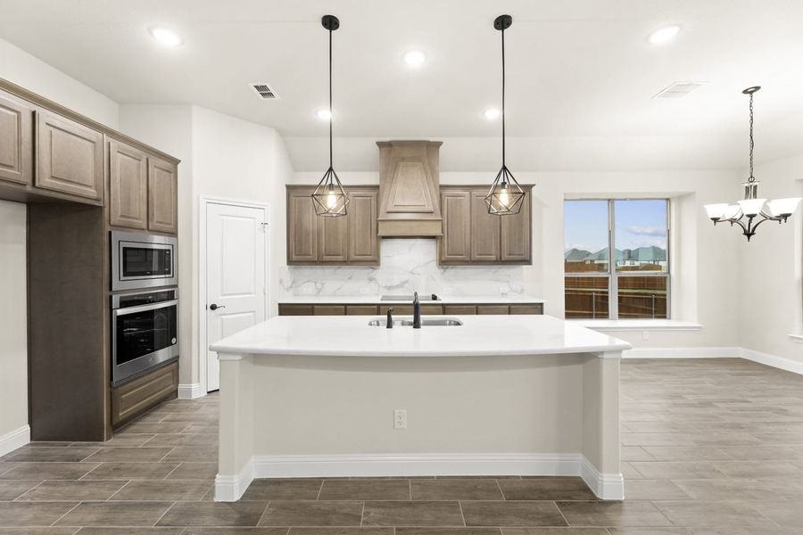 Kitchen | Concept 2370 at Villages of Walnut Grove in Midlothian, TX by Landsea Homes