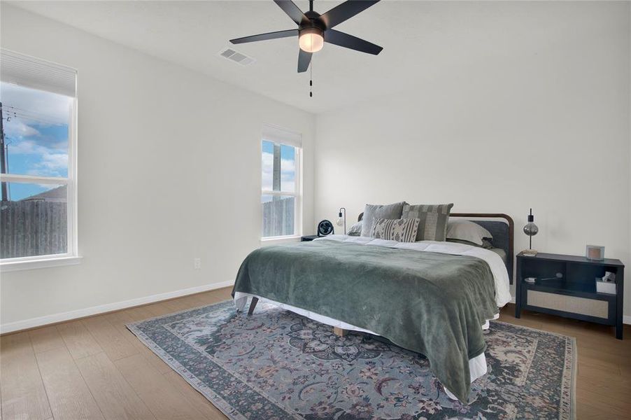 Primary bedroom has great natural lighting.