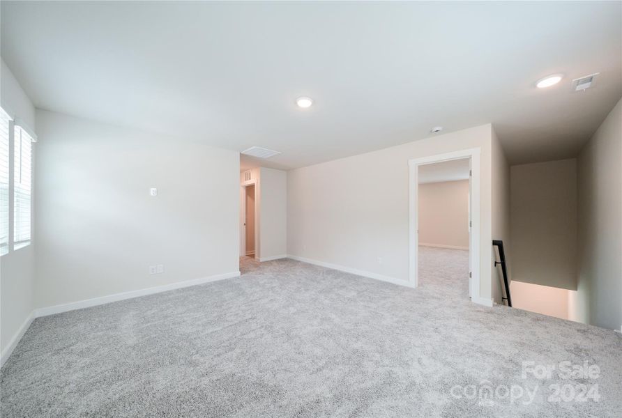 Carpeted upstairs, perfect for family needs