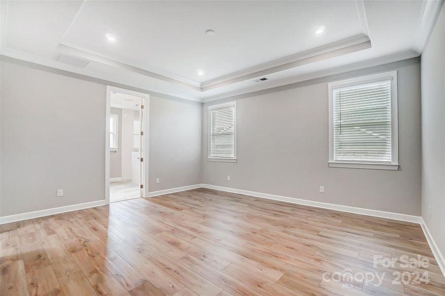 Primary Bedroom with Tray Ceiling-Similar to Subject Property