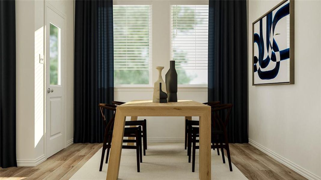 Dining area featuring a wealth of natural light and light wood-type flooring