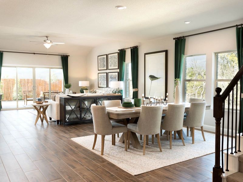 Sliding glass doors highlight this open-concept floorplan and add tons of natural light.