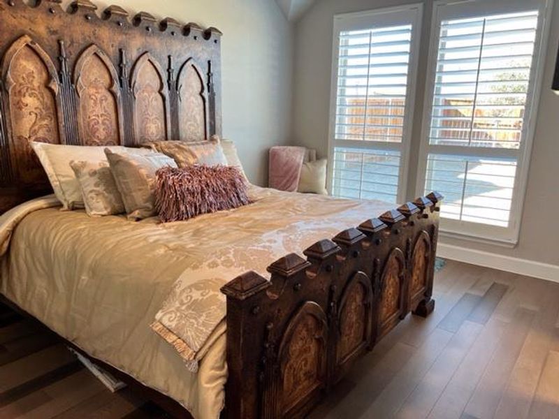 Bedroom featuring hardwood floors.