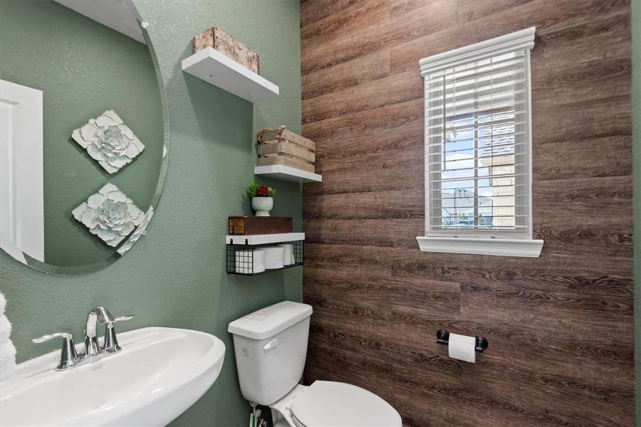 1st F Half Bathroom with decorative wood accent