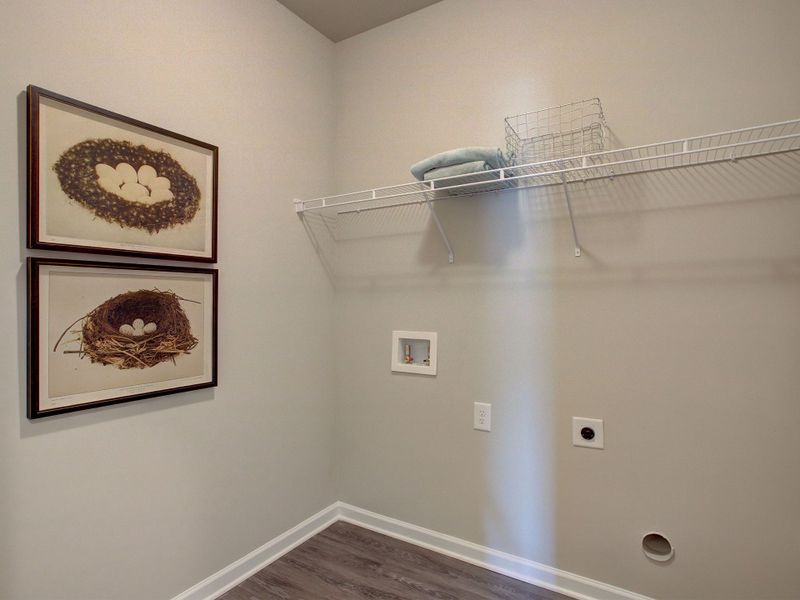 Convenient laundry room off of the primary bedroom