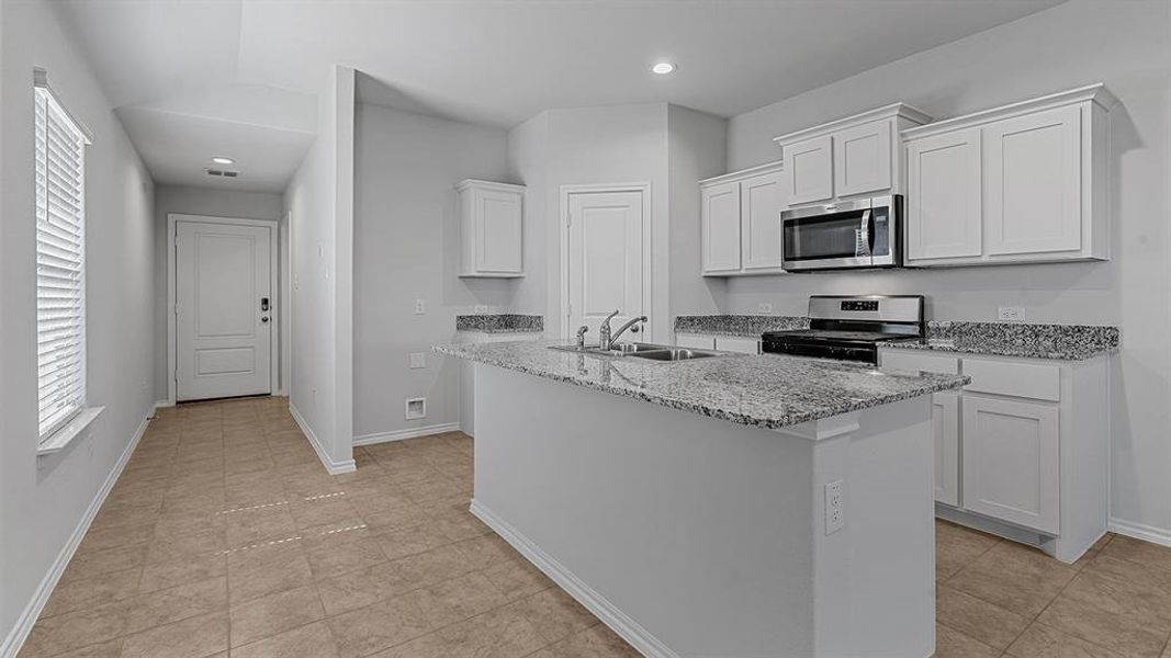 Kitchen - All Home and community information, including pricing, included features, terms, availability and amenities, are subject to change at any time without notice or obligation. All Drawings, pictures, photographs, video, square footages, floor plans, elevations, features, colors and sizes are approximate for illustration purposes only and will vary from the homes as built.