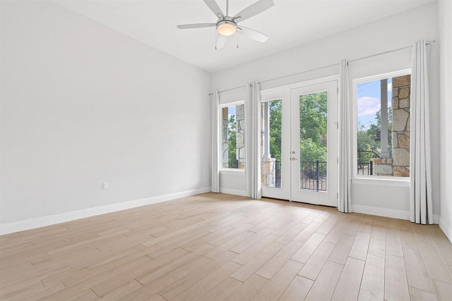 Primary bedroom with private doors to the patio