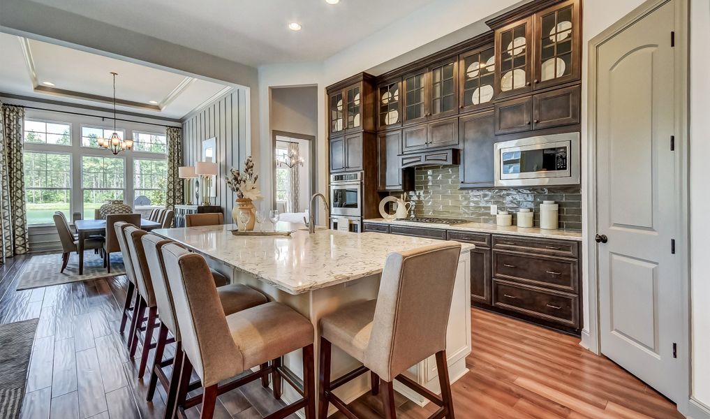 Gourmet kitchen with breakfast bar