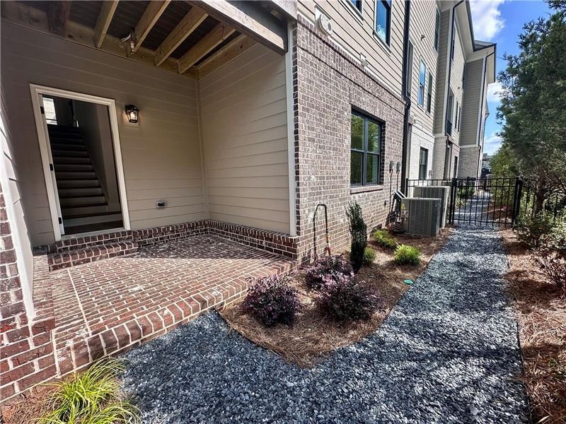 Private rear terrace patio provides fenced in backyard that your HOA maintains