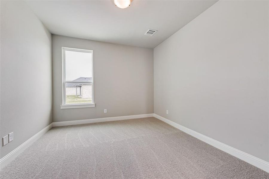 Unfurnished room with carpet floors