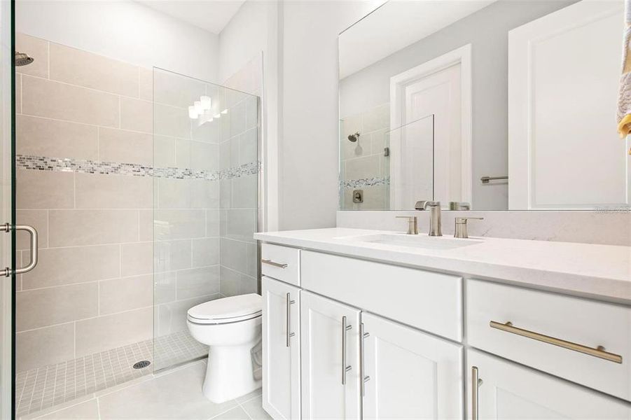 En-suite bathroom in the bedroom on the main level.