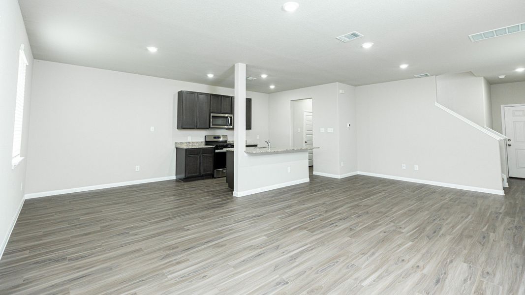 Family Room to Kitchen and Dining Area