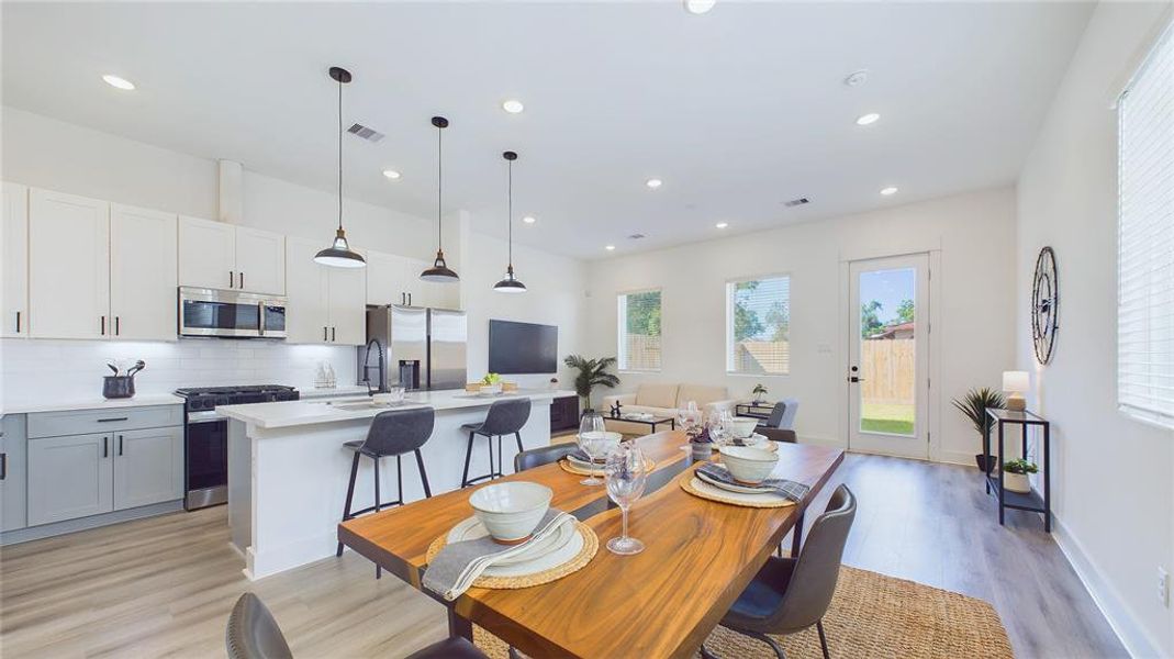 Open concept living area on the first floor - three bedrooms and two full baths on the second floor.