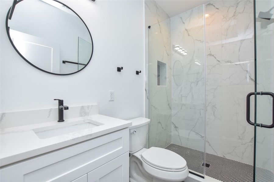 Primary ensuite bathroom. Look at the walk-in shower!