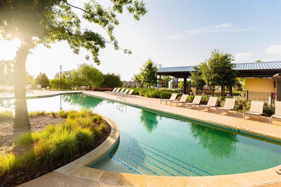 View of swimming pool with a patio