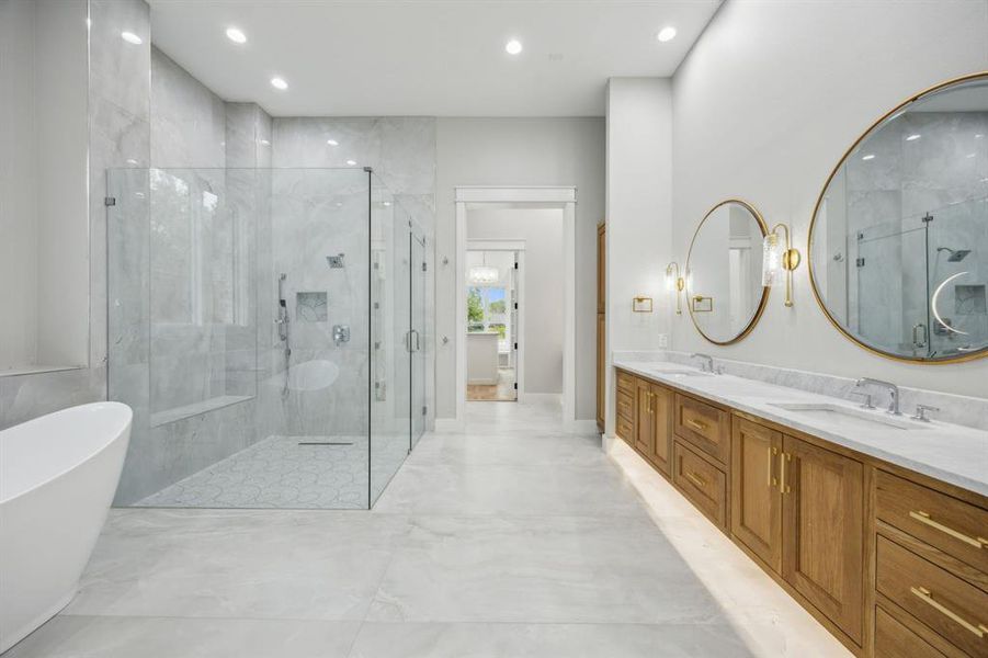 Gorgeous Large Tile flooring and Shower Surround; Brizo Plumbing Trim