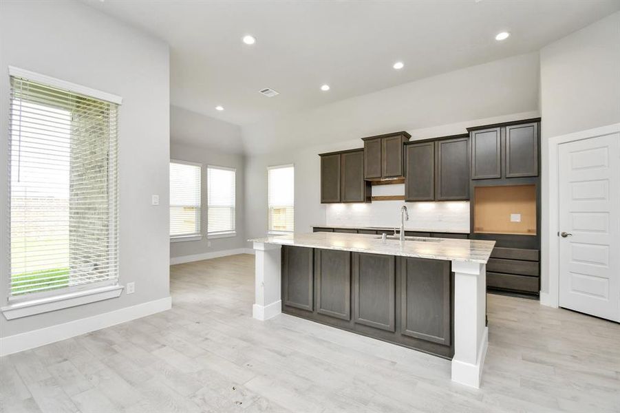 Discover another perspective of this stunning kitchen.