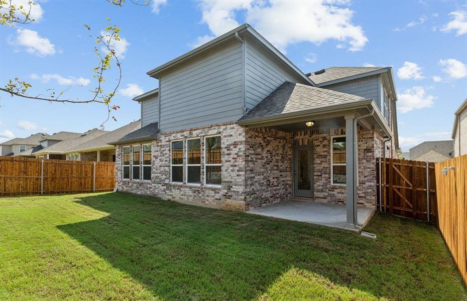 Large yard with covered patio