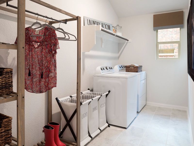 The spacious laundry room provides lots of space for all your cleaning needs.