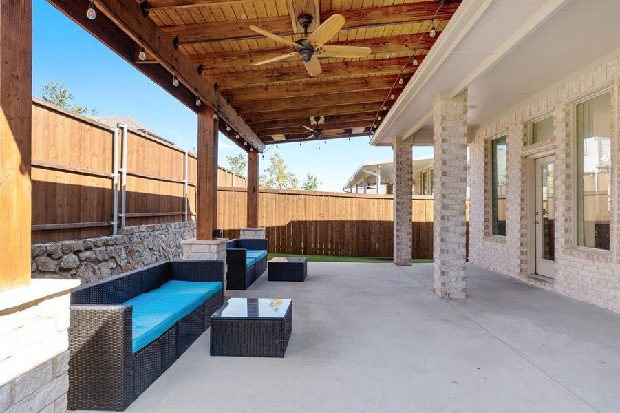 View of patio / terrace with ceiling fan and outdoor lounge area