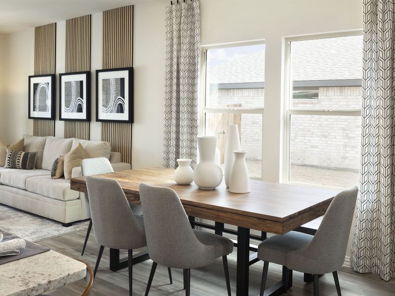 Enjoy family dinners around the dining table.