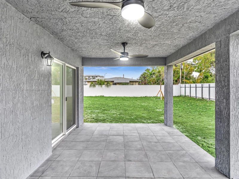 Covered patio area, perfect to set a summer kitchen