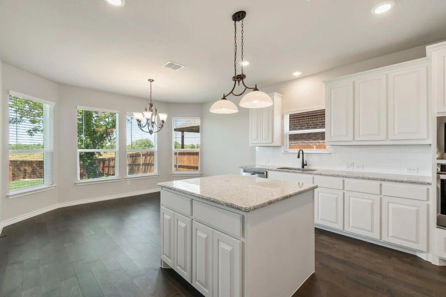 Kitchen | Concept 2393 at Lovers Landing in Forney, TX by Landsea Homes