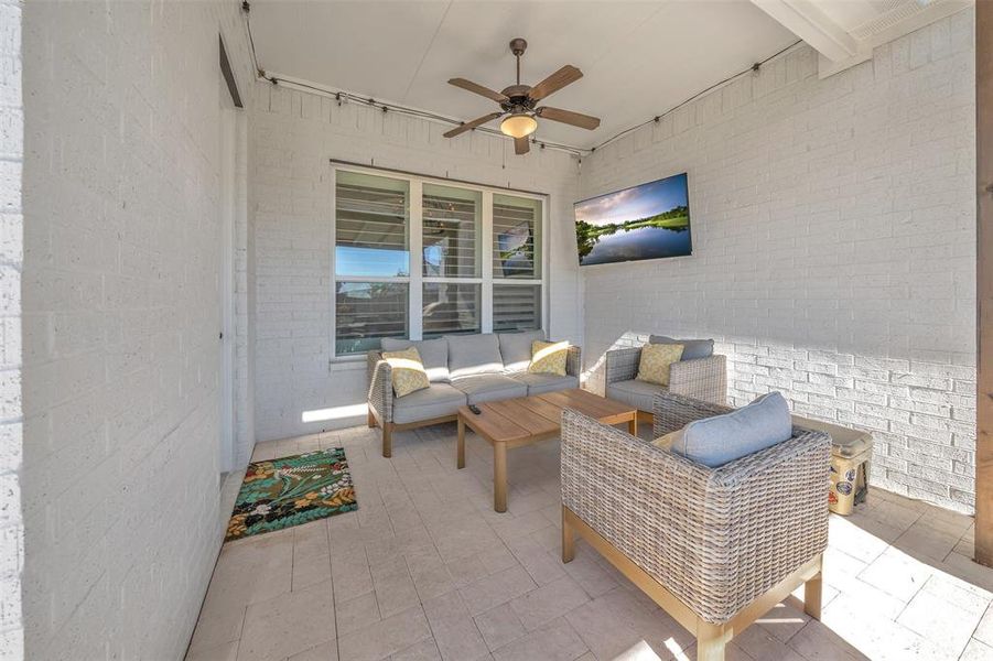 View of patio / terrace featuring outdoor lounge area and ceiling fan